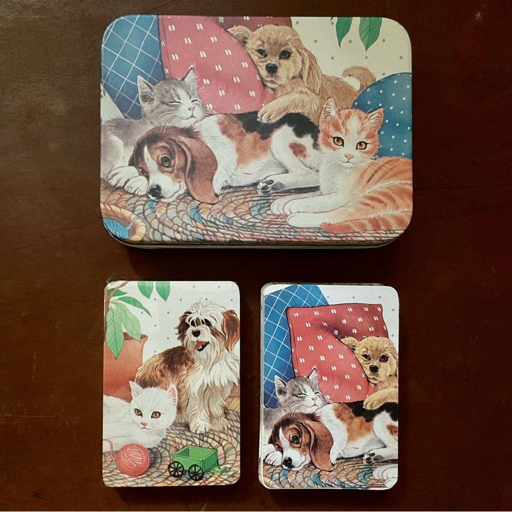 Two cute vintage decks of cards in metal tin